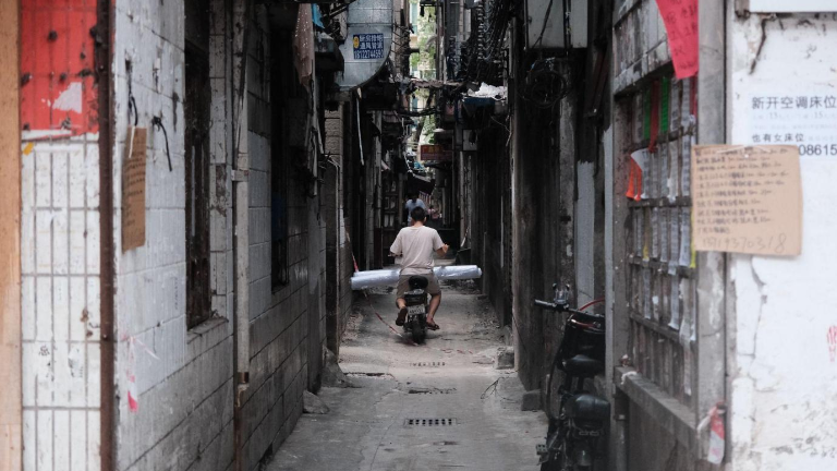 Glimpse Inside China’s Vanishing Garment Hub over
